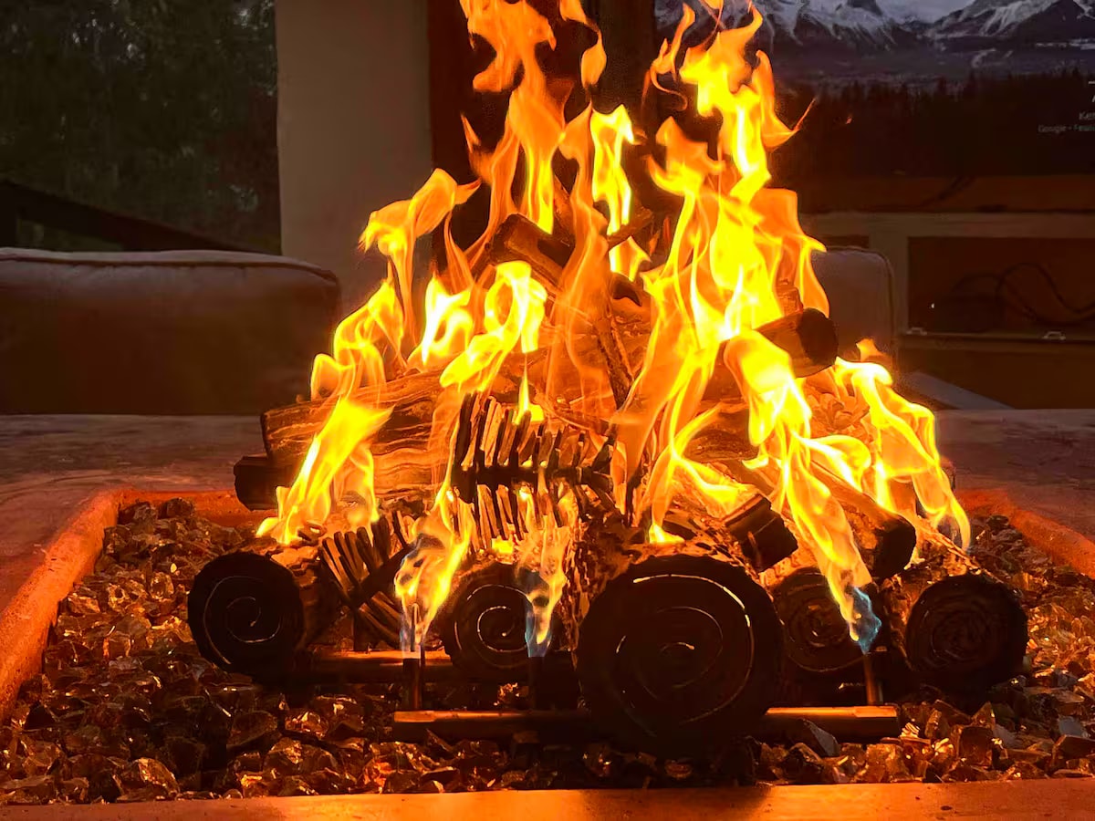 Hobbit House fire pit with glowing custom logs